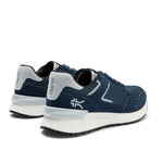 Close-up of the heel cup on the KURU APOGEE Unisex Sneaker in Indigo-Bright White.