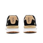 Back heel view of the KURU APOGEE Unisex Sneaker in Jet Black-Buff Tan.