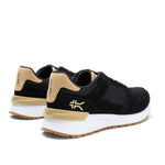 Close-up of the heel cup on the KURU APOGEE Unisex Sneaker in Jet Black-Buff Tan.