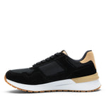 Inner side view of the KURU APOGEE Unisex Sneaker in Jet Black-Buff Tan.