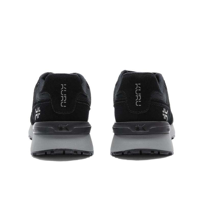 Back heel view of the KURU APOGEE Unisex Sneaker in Jet Black-Storm Gray.