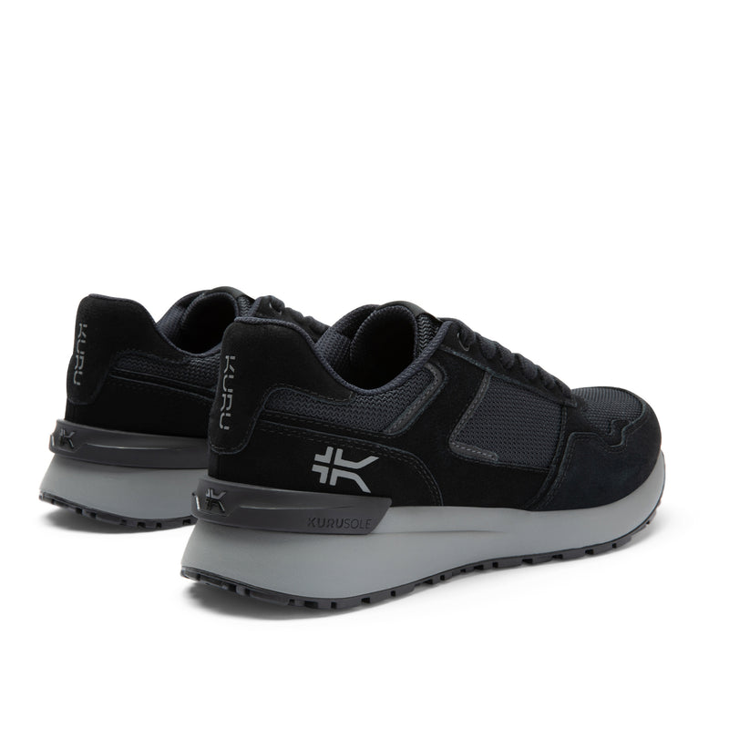 Close-up of the heel cup on the KURU APOGEE Unisex Sneaker in Jet Black-Storm Gray.