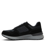 Inner side view of the KURU APOGEE Unisex Sneaker in Jet Black-Storm Gray.