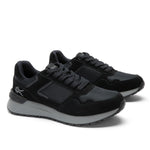 Pair of KURU APOGEE Unisex Sneaker in Jet Black-Storm Gray, angled view.