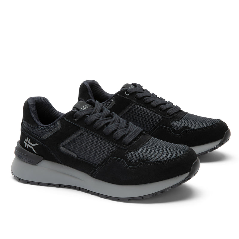 Pair of KURU APOGEE Unisex Sneaker in Jet Black-Storm Gray, angled view.