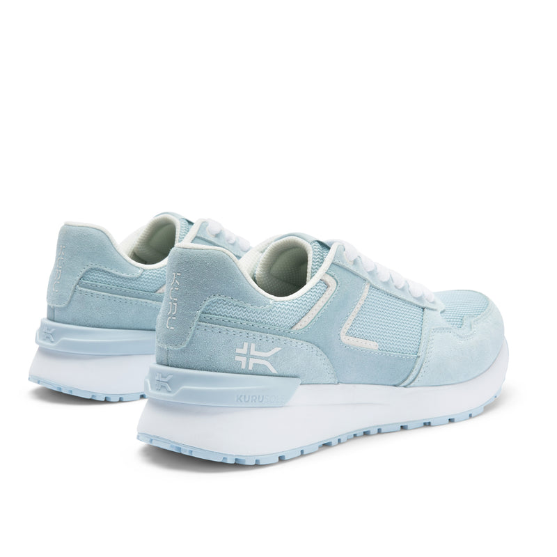Close-up of the heel cup on the KURU APOGEE Unisex Sneaker in Mist Blue-Bright White.