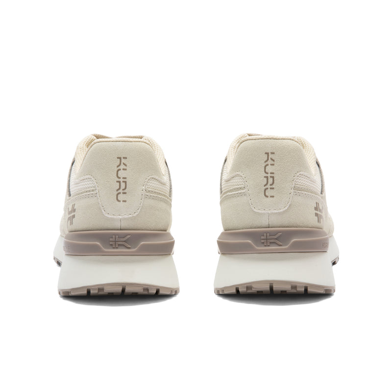 Back heel view of the KURU APOGEE Unisex Sneaker in Sand-Ecru.