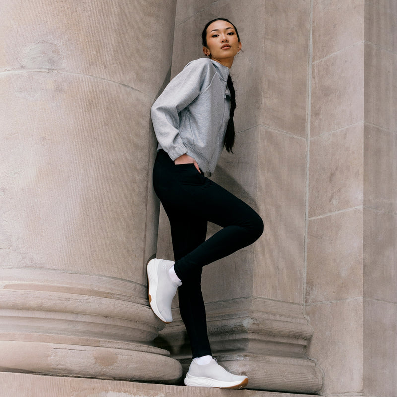 Angled profile view of the KURU ATOM 2 Slip-On Women's Slip-On Sneaker in Dove Gray-Gum.