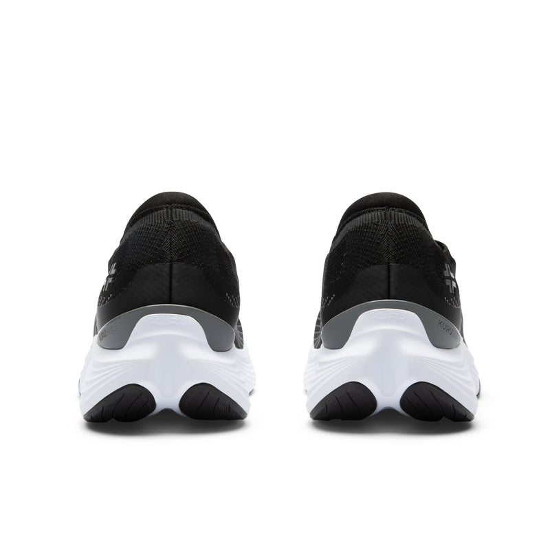 Back heel view of the KURU ATOM 2 Slip-On Men's Slip-On Sneaker in Jet Black-Bright White.