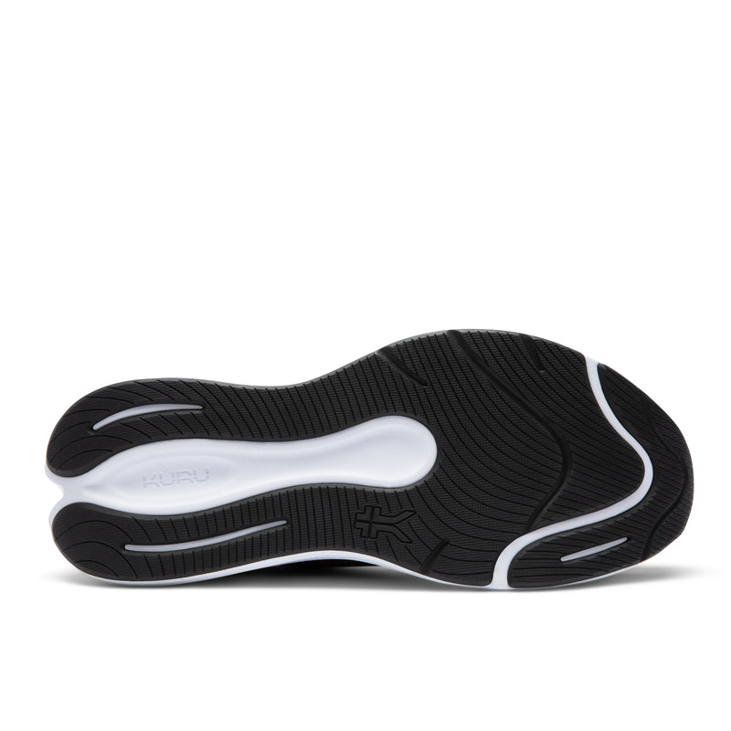 Outsole view of the KURU ATOM 2 Slip-On Men's Slip-On Sneaker in Jet Black-Bright White, showing the KURUSOLE tread.