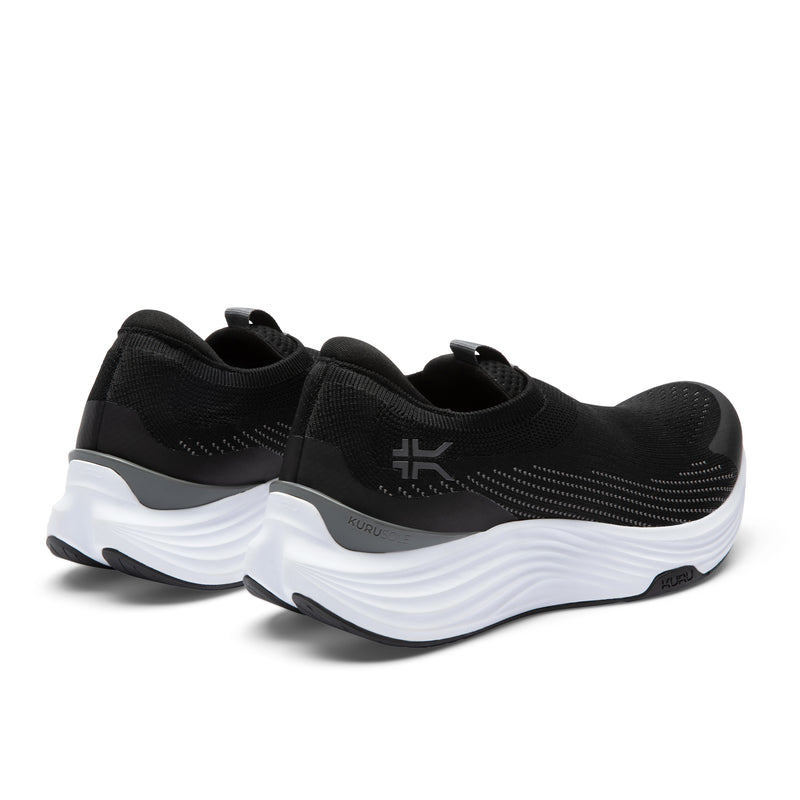 Close-up of the heel cup on the KURU ATOM 2 Slip-On Men's Slip-On Sneaker in Jet Black-Bright White.