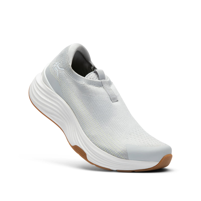 Angled profile view of the KURU ATOM 2 Slip-On Women's Slip-On Sneaker in Dove Gray-Gum.