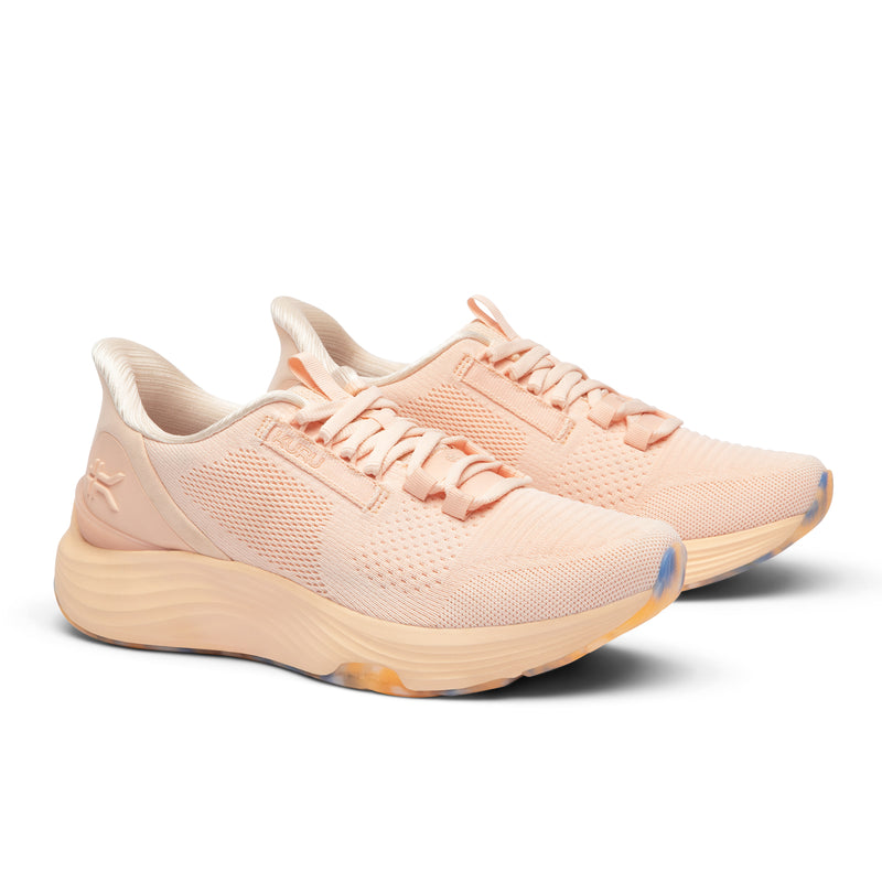 Pair of KURU ATOM 2 Women's Sneaker in Peach Glacier, angled view.