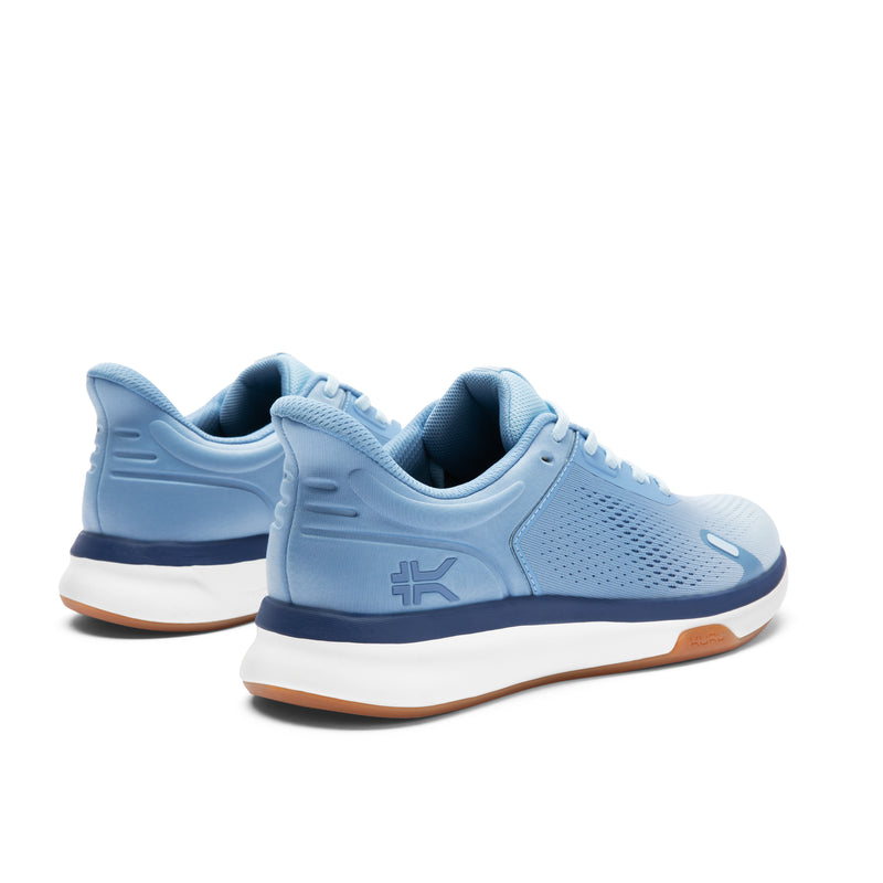 Close-up of the heel cup on the KURU ATOM Fusion Women's Sneaker in Mist Blue-Twilight Purple.