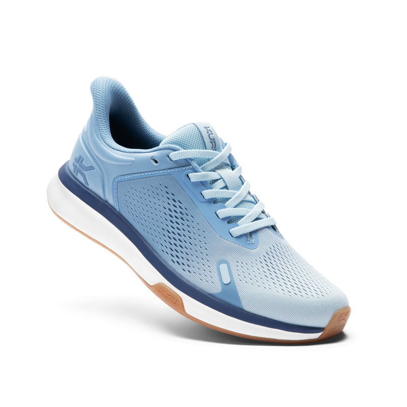 Angled profile view of the KURU ATOM Fusion Women's Sneaker in Mist Blue-Twilight Purple.