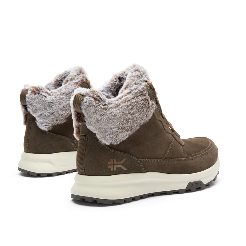 Close-up of the heel cup on the KURU ATOM Lumi Women's Sneaker in Burnt Olive-Sand.