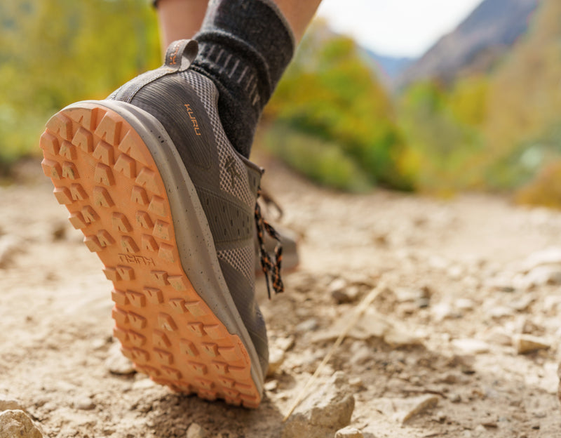 Person breaking in their KURU shoes, showing a step in the recommended break-in process.
