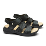 Pair of KURU CODA Muse Women's Sandal in Jet Black-Emboss, angled view.