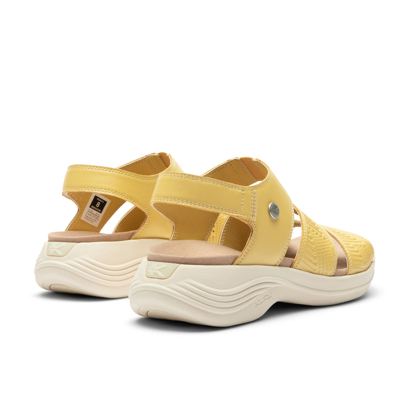 Close-up of the heel cup on the KURU CODA Muse Women's Sandal in Pineapple Splash.