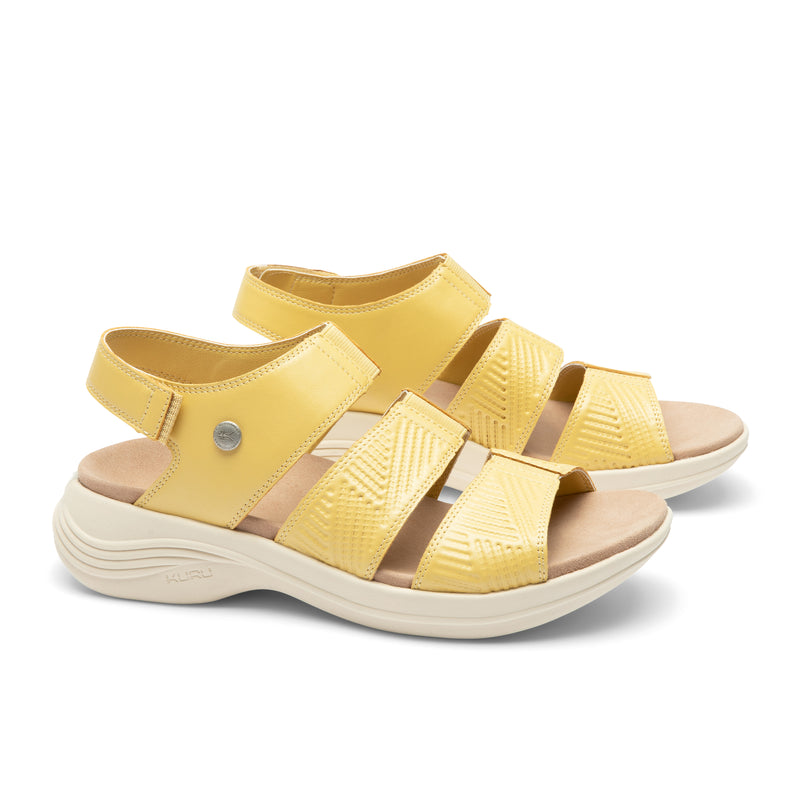 Pair of KURU CODA Muse Women's Sandal in Pineapple Splash, angled view.