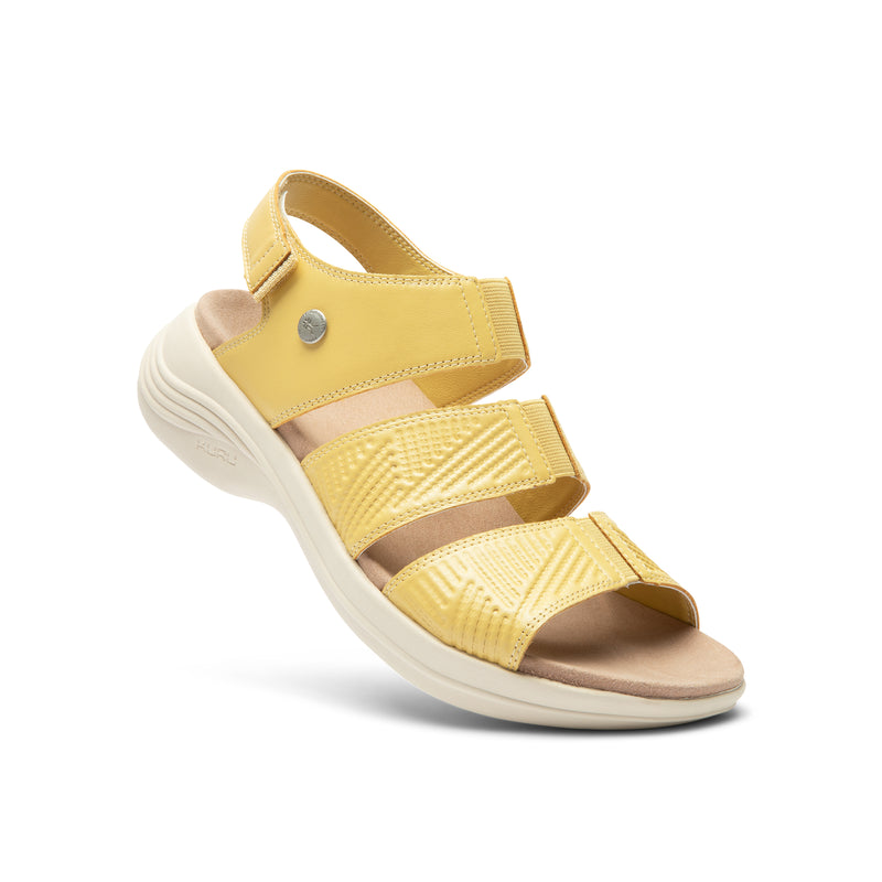 Angled profile view of the KURU CODA Muse Women's Sandal in Pineapple Splash.