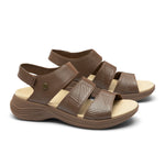 Pair of KURU CODA Muse Women's Sandal in Molasses Brown, angled view.
