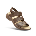 Angled profile view of the KURU CODA Muse Women's Sandal in Molasses Brown.