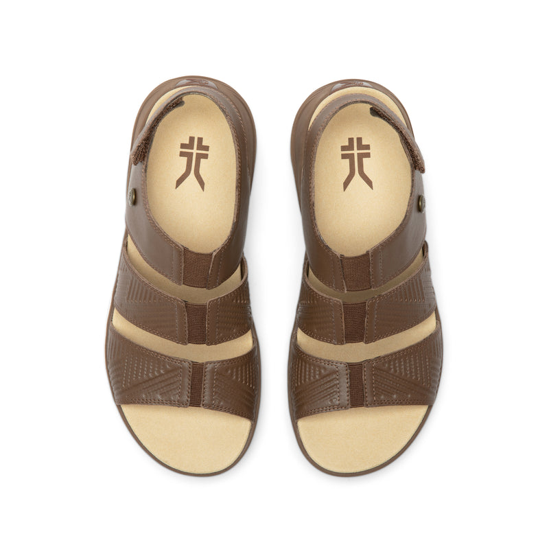 Top-down view of the KURU CODA Muse Women's Sandal in Molasses Brown.