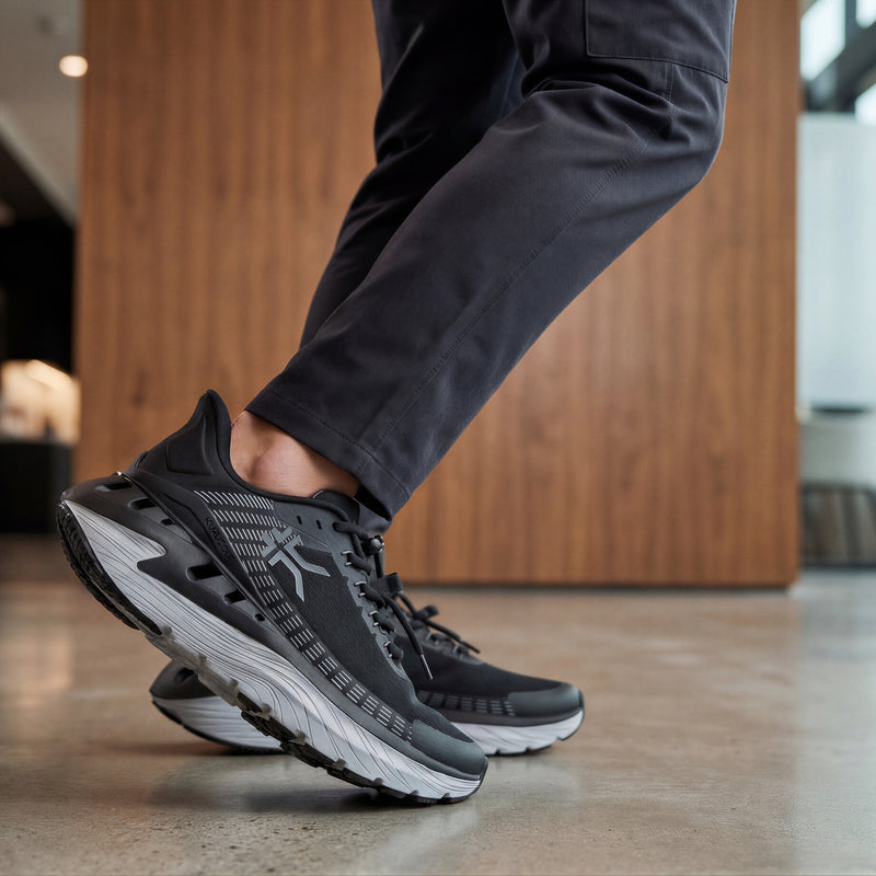 Pair of KURU CURA Unisex Shoe in Jet Black-Storm Gray, angled view.
