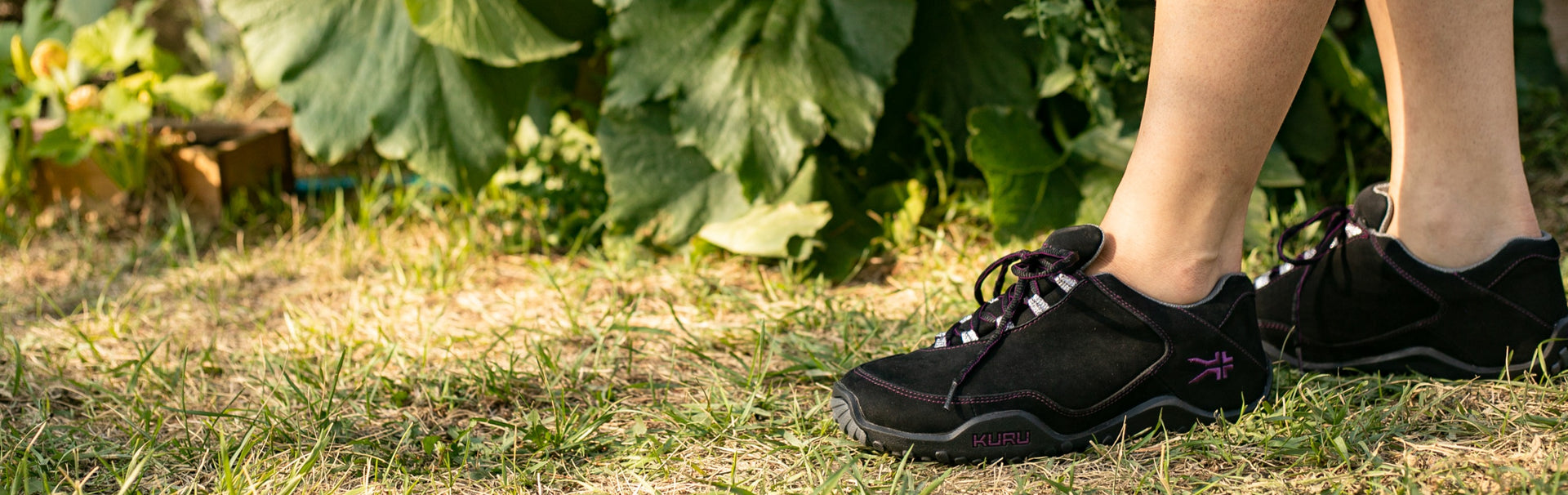 KURU CHICANE hiking shoes on a rugged trail, built for all-day comfort and foot pain relief.