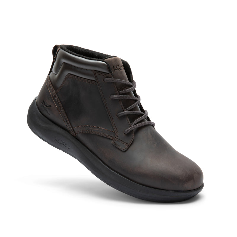 Angled profile view of the KURU DRAFT Aalto Men's Slipper in Tobacco Brown-Jet Black.