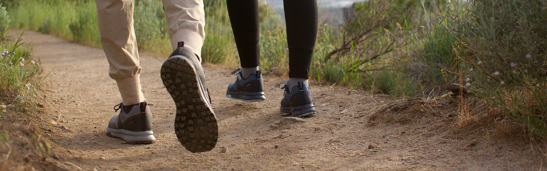 KURU ATOM Trail shoe shown in a hiking use-case setting, ideal for trail and outdoor activities.