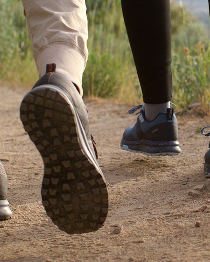 KURU ATOM Trail hiking shoe shown on a trail surface, ideal for hiking.