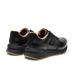 Close-up of the heel cup on the KURU APOGEE Luxe Unisex Leather Sneaker in Jet Black-Gum.