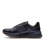 KURU APOGEE Luxe Unisex Leather Sneaker in Jet Black-Gum, inner side profile.