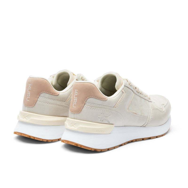 Close-up of the heel cup on the KURU APOGEE Luxe Unisex Leather Sneaker in Taupe Gray-Gum.