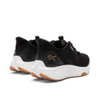 Close-up of the heel cup on the KURU ATOM 2 Men's Athletic Sneaker in Jet Black-Desert Tan.