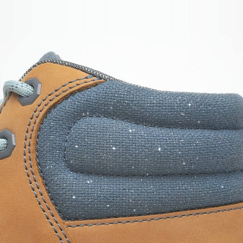 Close-up of the upper material on the KURU QUEST Women's Boot in Golden Wheat-Slate Gray-Blue Haze.