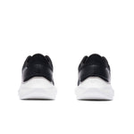Rear view of the heel on the KURU DASH Vanta Unisex Athletic Sneaker in Jet Black-Bright White.