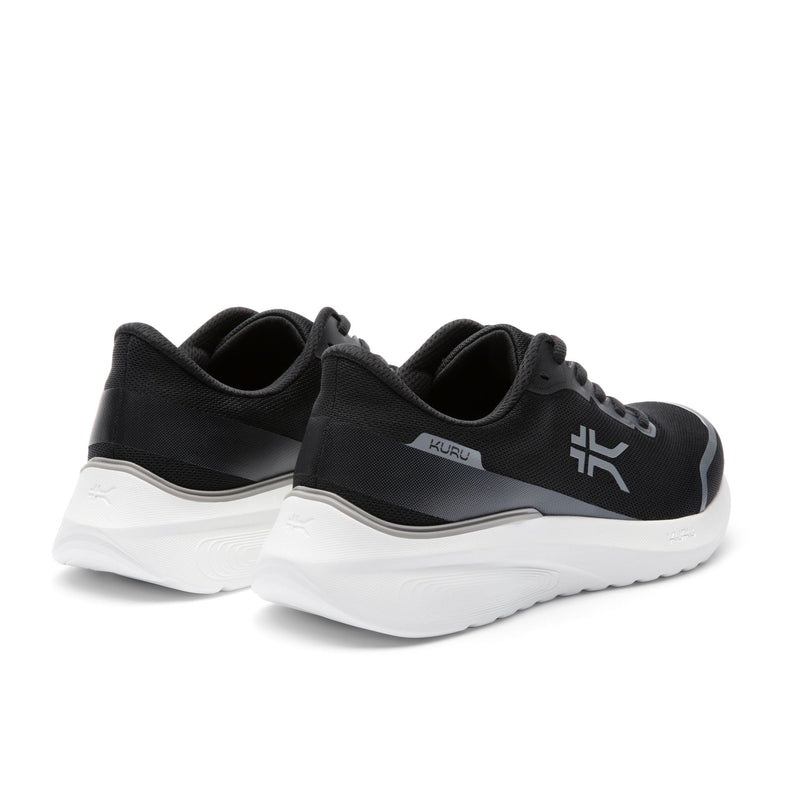 Close-up of the heel on the KURU DASH Vanta Unisex Athletic Sneaker in Jet Black-Bright White.