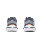 Rear view of the heel on the KURU DASH Vanta Unisex Athletic Sneaker in Smoke Gray.