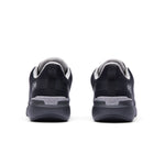 Back view of the KURU FLEX Via Waterproof Unisex Sneakers in Jet Black-Tungsten Gray, showing the heel counters.

