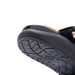 Close-up of the KURUCLOUD outsole on the KURU MOMENT Ease Women's Clog in Jet Black.