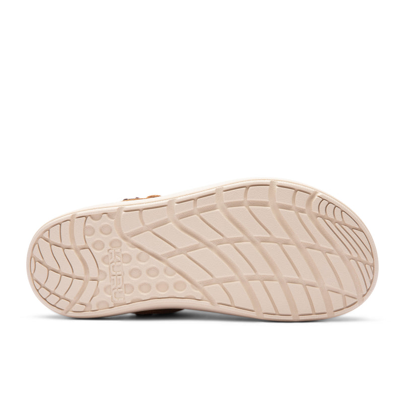 Outsole of the KURU MOMENT Ease Women's Clog in Toffee Brown-Sand showing the tread pattern.