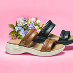 Outsole view of the KURU CODA Mesa Women's Sandal in Amber Brown-Pearl White, showing the KURUSOLE tread.