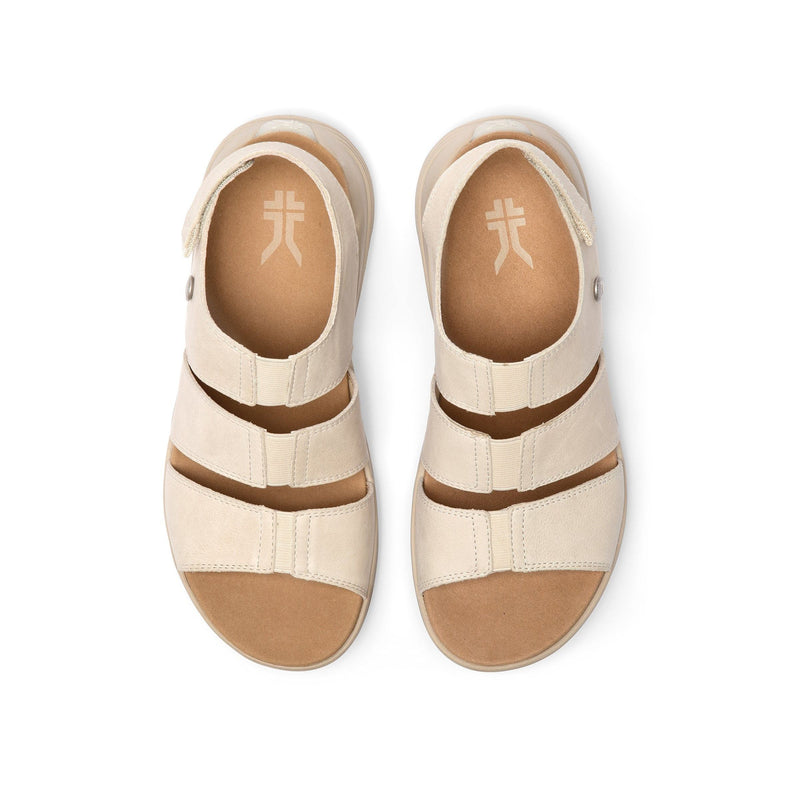 Back heel view of the KURU CODA Muse Women's Sandal in Shell-Sand.