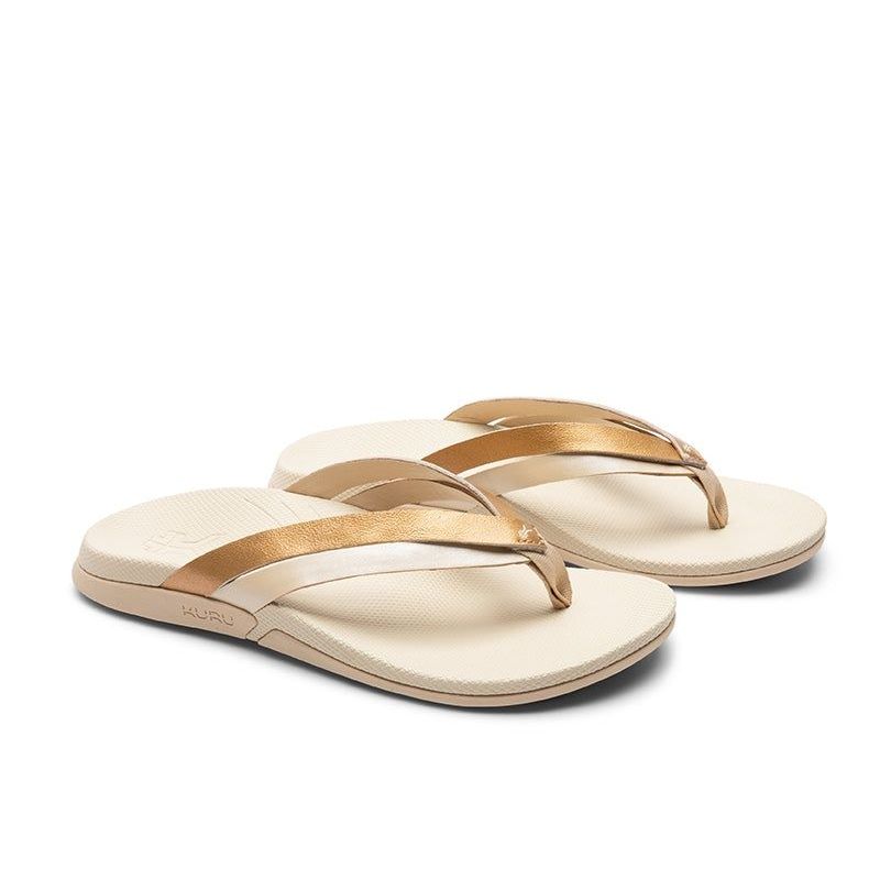 Pair of KURU KALA Sieva Women's Sandal in Sand-Metallic, angled view.