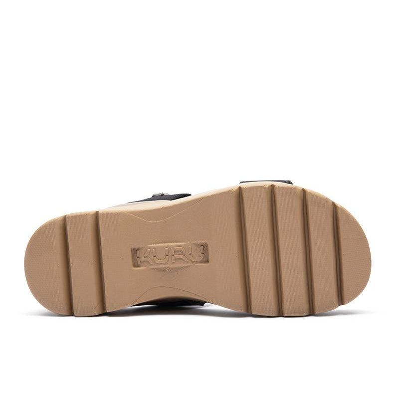 Close-up of the heel cup on the KURU LOMA Tila Women's Sandal in Jet Black-Sand.