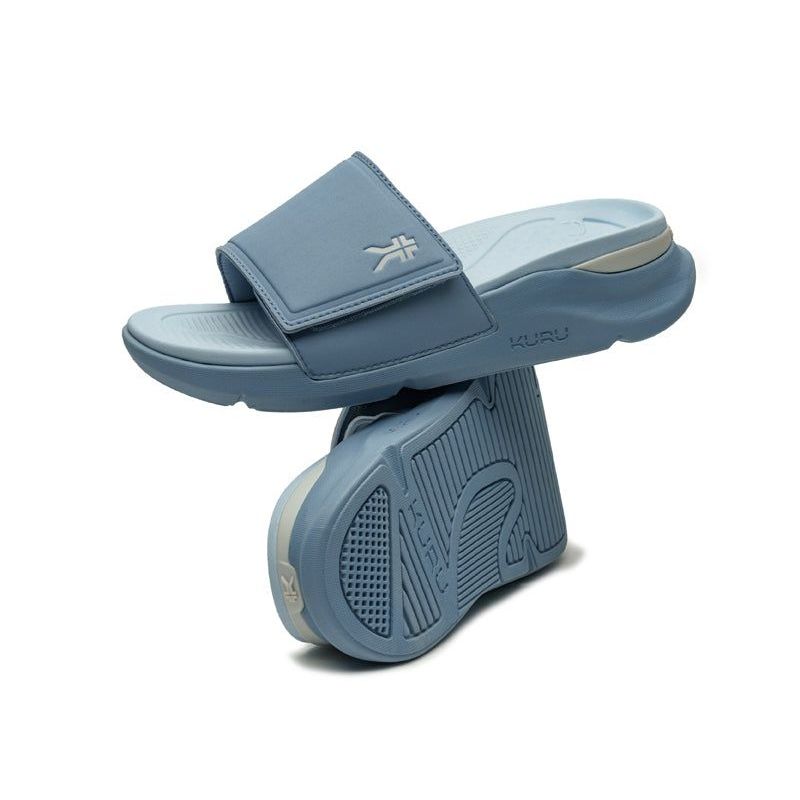 Pair of KURU MOMENT Women's Sandal in Blue Fog-White, angled view.