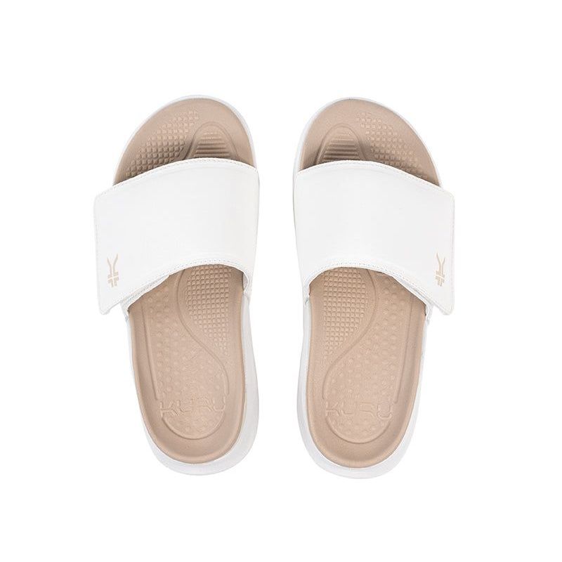Back heel view of the KURU MOMENT Women's Sandal in Bright White-Sand.